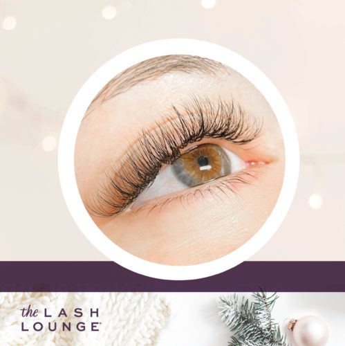 close-up of a woman's eye with hybrid lash extensions