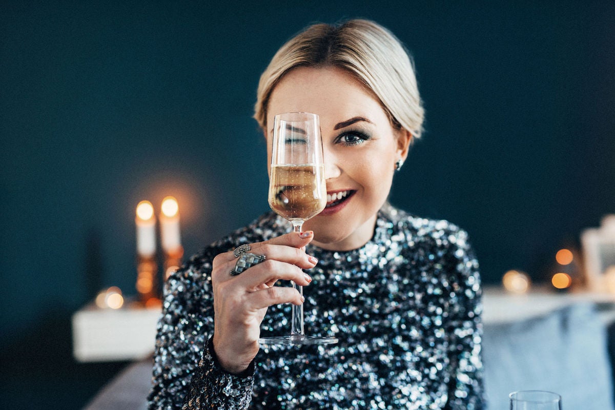 blonde woman holidays lashes