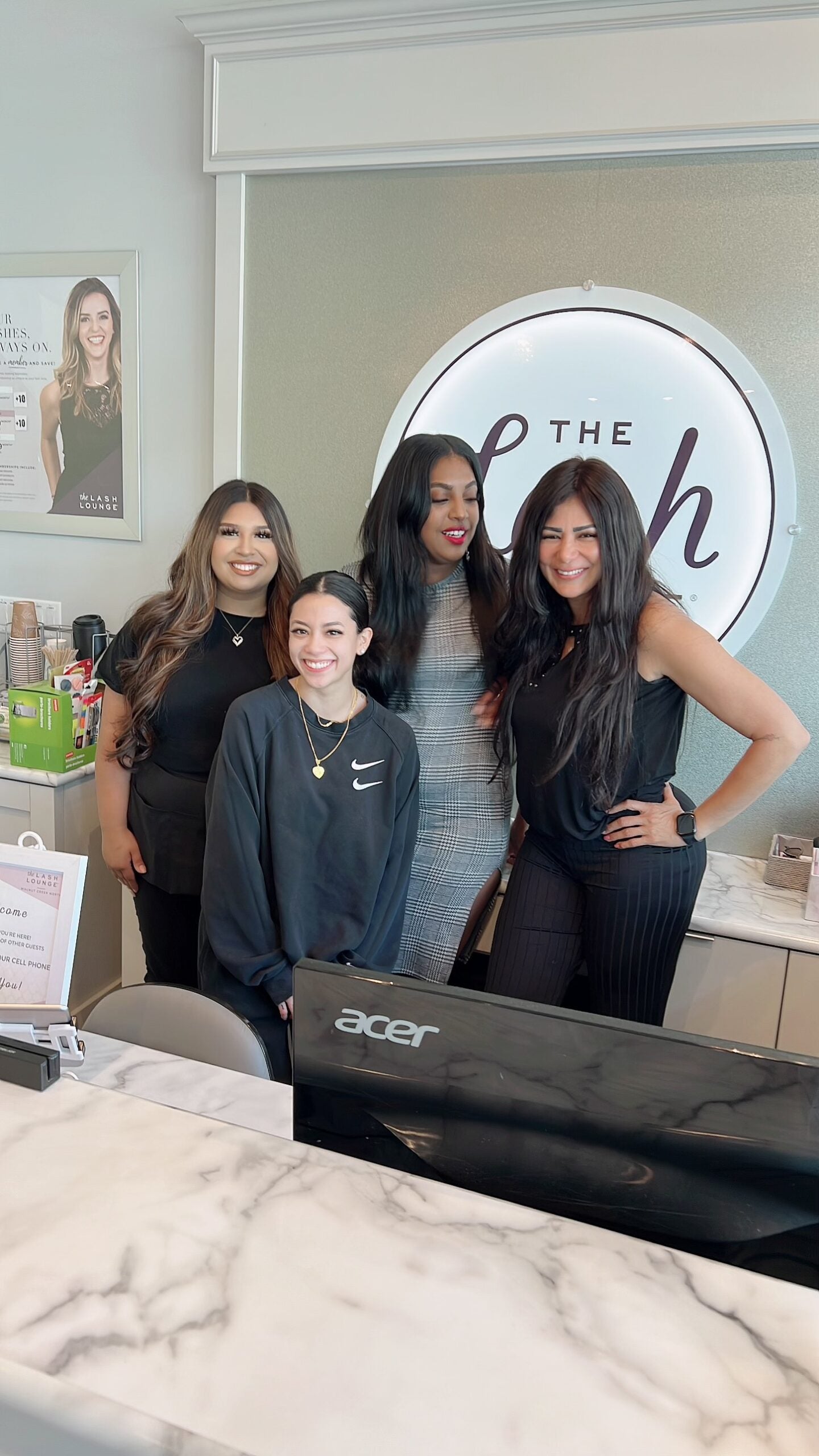 Salon team behind front desk